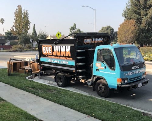 Bye Junk truck picking up unwanted items for junk removal in San Leandro